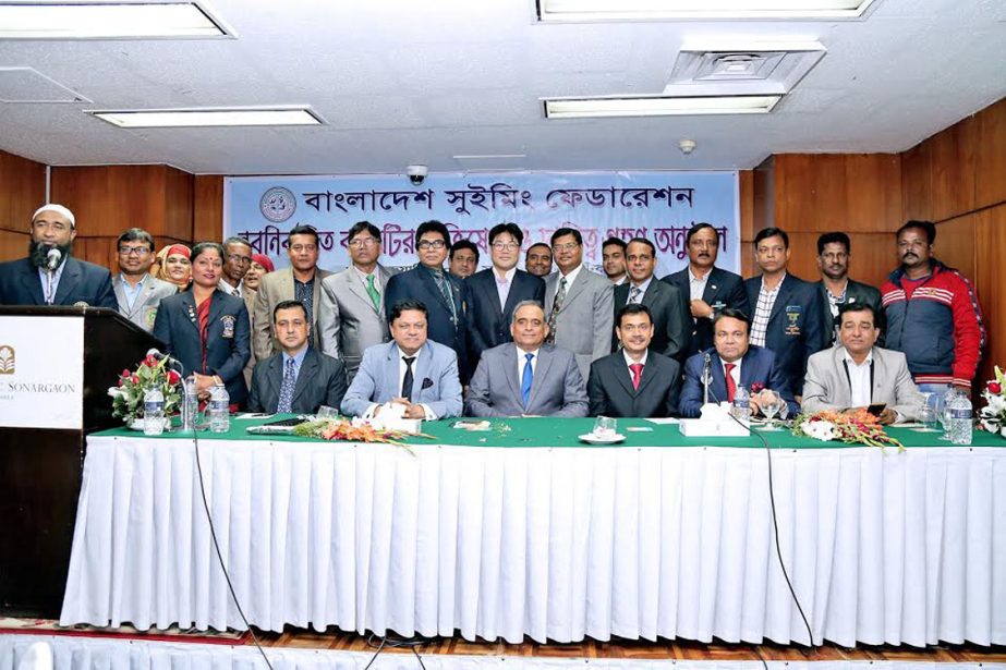 The newly elected Executive Committee of Bangladesh Swimming Federation poses for a photo session at the Pan Pacific Sonargaon Hotel in the city on Tuesday last.
