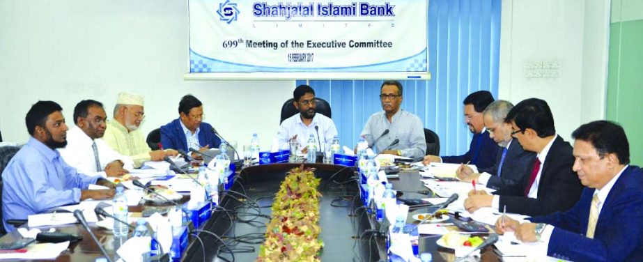 Md Sanaullah Shahid, EC Chairman of Shahjalal Islami Bank Limited presided over its 699th EC meeting at the banks head office in the city recently. Mohiuddin Ahmed, Vice-Chaiman of Board of Directors, Fakir Akhtaruzzaman, Vice-Chaiman of the EC, Anwer Hos