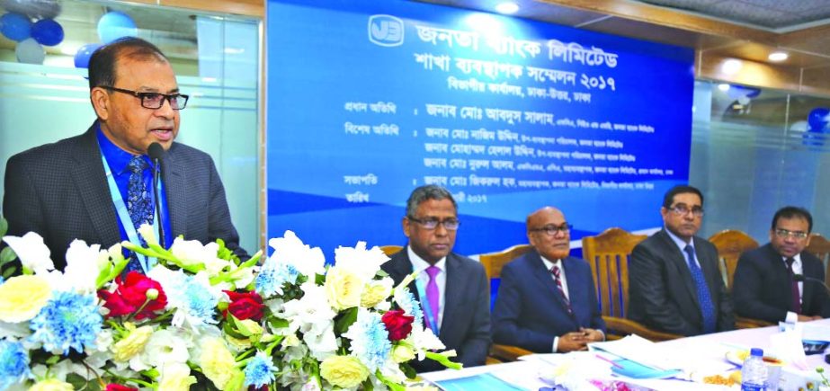 Md Abdus Salam, Managing Director of Janata Bank Ltd, delivering speech at its Dhaka North Divisional Conference at a city hotel on Friday. Md Nazim Uddin, Md Helal Uddin, Deputy Managing Directors, Md Nurul Alam, General Manager and 56 Branch Managers of