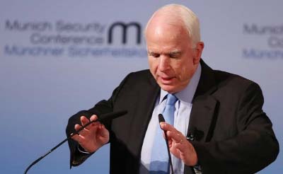 Republican Senator John McCain speaking the Munich Security Conference on Friday.