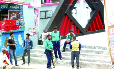 KHULNA: Policemen are standing wearing shoes on Daulatpur Central Shaheed Minar in the city while they were on duty. This picture was taken yesterday.