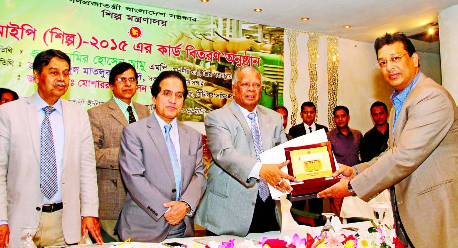 Azharul Islam, Managing Director of Islam Re-Rolling Mills Ltd, receiving a CIP Card (Industry)-2015 from Industry Minister Amir Hossain Amu, MP held at a city hotel on Sunday. 5Md Mosharraf Hossain Bhuiyan, NDC, Senior Secretary of the Ministry of Indust