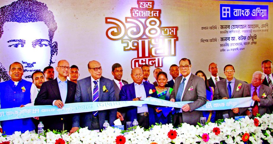 Commerce Minister Tofail Ahmed, MP, inaugurating the 114th branch of Bank Asia at Sadar Road in Bhola town on Sunday. A Rouf Chowdhury, Chairman, Mohd Safwan Choudhury, Vice-Chairmen, AM Nurul Islam, EC Chairman, Rumee A Hossain, Chairman, Board of Audit