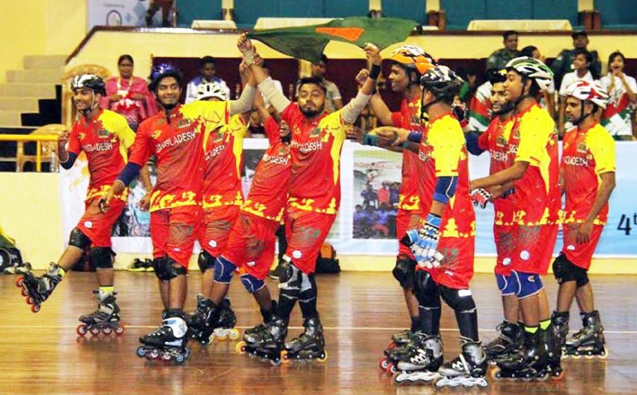 Bangladesh Men's Rollball team celebrating after thrashing Myanmar Men's Rollball team by 11-0 goals in their match of the 4th Rollball World Cup at the Shaheed Suhrawrdy Indoor Stadium in Mirpur on Sunday.