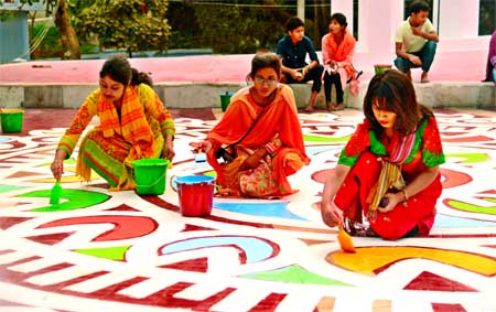 Students of the Institute of Fine Arts decorating the premises of Central Shaheed Minar by printing of Bangla alphabets ahead of the celebration of Amar Ekushey and International Mother Language Day. This photo was taken on Sunday.