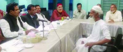 BANARIPARA(Barisal): Adv Talukder Md Yousuf MP talking to a freedom fighter at Banaripara Upazila at scrutiny meeting of real freedom fighters on Friday.