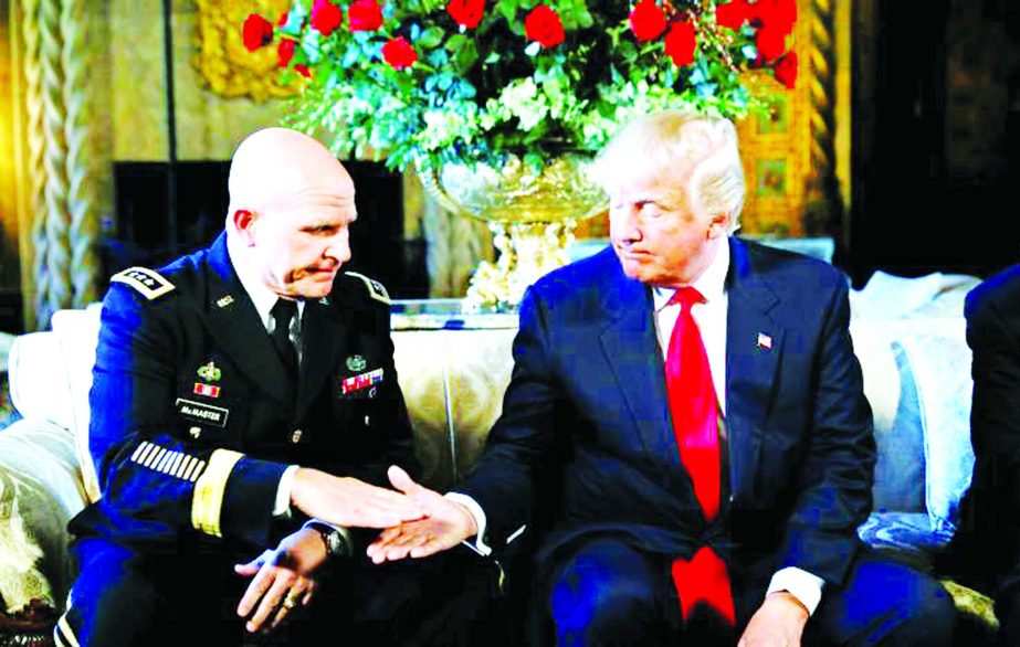 US President Donald Trump shakes hands with his new National Security Adviser Army Lt. Gen. H.R. McMaster after making the announcement at his Mar-a-Lago estate in Palm Beach, Florida U.S. on Monday.