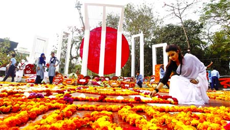 Marking the Amar Ekushey and International Mother Language Day on Tuesday, the Central Shaheed Minar bedecked with flowers placed by the people of all Strata of life.