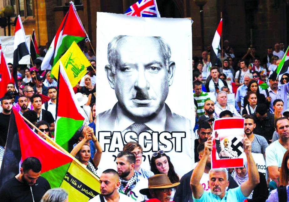 Pro-Palestinian activists demonstrate against a visit by Israel PM Benjamin Netanyahu, during a protest rally in Sydney on Thursday.