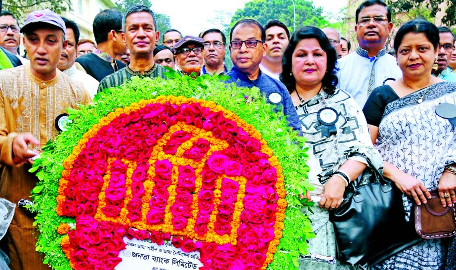 Md Abdus Salam, CEO and Managing Director of Janata Bank Limited placing wreaths to the language martyrs at the Central Shaheed Minar in the city on Tuesday. Md Abdus Salam Azad, Md Nazim Uddin and Md Helal Uddin, Deputy Managing Directors, Officers Assoc