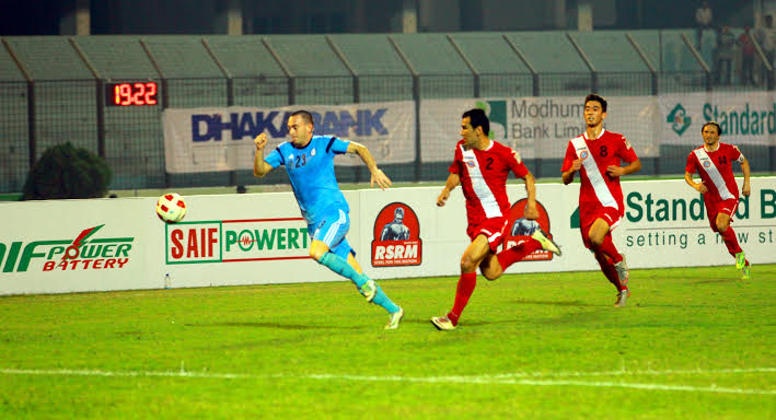 An action from the football match of the Sheikh Kamal International Club Cup between Dhaka Abahani Limited and FC Alga of Kyrgyzstan at the MA Aziz Stadium in Chittagong on Thursday. Dhaka Abahani won the match 2-1.