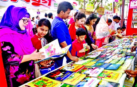 Book-lovers continue to rush at Suhrawardy Udyan as one week away to end the Boi Mela. This photo was taken on Thursday.