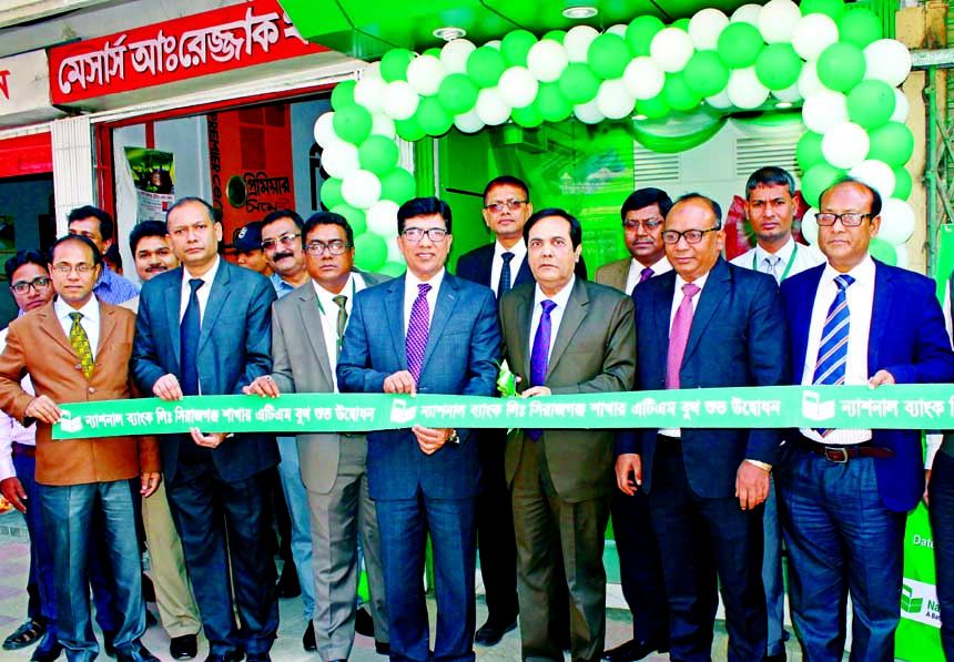 Wasif Ali Khan, Additional Managing Director of National Bank Limited inaugurating a new ATM booth under Q-cash network at its Sirajganj branch premise recently. Md Mahfuzur Rahman, Executive Vice President and Head of Card Division, Md Ali Haider Mortuza