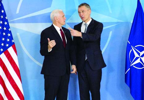 US Vice President Mike Pence (L) with NATO Secretary General Jens Stoltenberg, has gone to great lengths to reassure European leaders, Washington is not giving up on its allies.