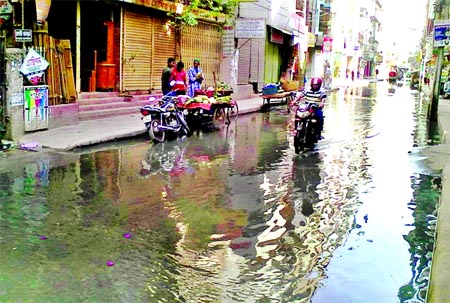 A big portion of the main thoroughfare in city's Zigatala area was being waterlogged with dirty water due to drainage mismanagement even in dry season causing sufferings to pedestrians and commuters. This photo was taken on Saturday.