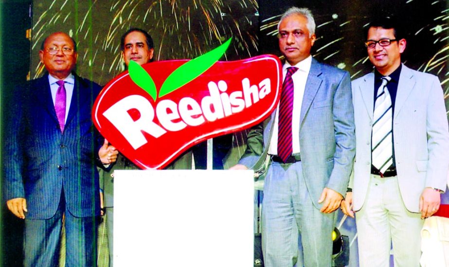 Commerce Minister Tofail Ahmed,MP, inaugurating Reedisha Food & Beverage Limited at Radison Water Garden Hotel in the city on Saturday. Advocate Md Rahmat Ali, MP, (Gazipur-3), Rezaul Karim, Managing Director, Md Abul Khair, Director, (Corporate Affairs)