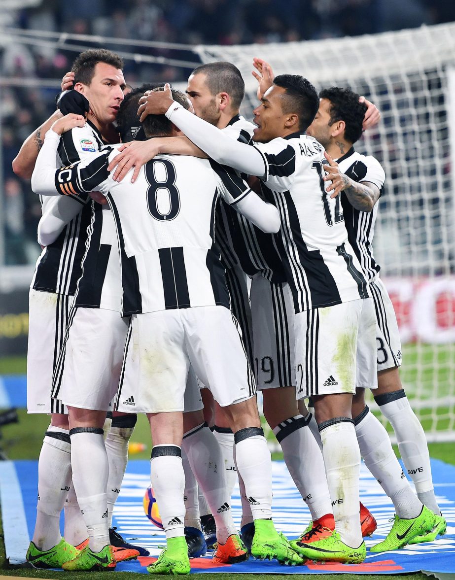Juventus' Mario Mandzukic celebrates a goal with his teammates during the Italian Serie A soccer match between Juventus and Empoli at the Juventus stadium in Turin, Italy on Saturday.
