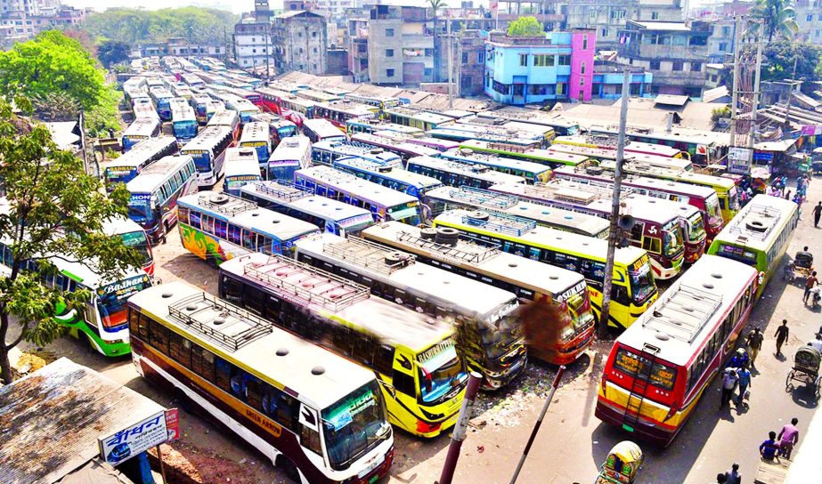 All modes of vehicles, including the long-distance ones, stay grounded in all inter-district bus terminals in the city as well as in district bus stands across the country due to the sudden transport strike called by transport workers. This photo was take