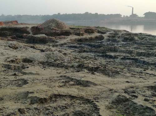 NARSINGDI: Miscreants illegally cutting mud from AK Khan Economic Zone at Kazirchar village of Dangha Union . This snap was taken yesterday.