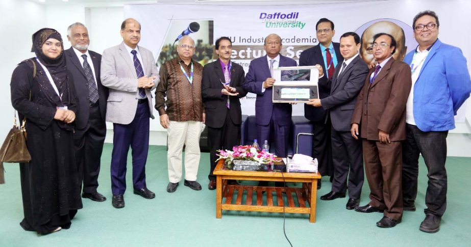 Md. Sabur Khan, Chairman, Board of Trustees of Daffodil International University handing over a memento to Latifur Rahman, Chairman and CEO of Transcom Group at DIU Industry Academia Lecture Series held on Monday at the University.