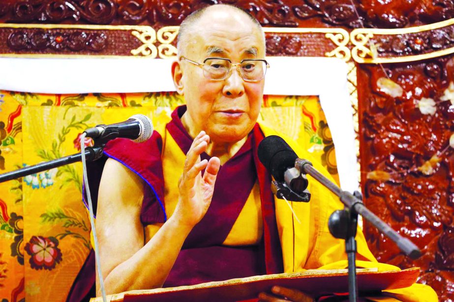 Tibet's exiled spiritual leader the Dalai Lama addressing a news conference in Paris, France.