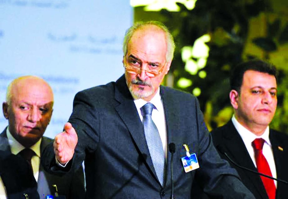 Syrian Chief negotiator Bashar al-Jaafari Â©, Ambassador of the Permanent Representative Mission of Syria to UN New York, speaks at a press conference on the Intra-Syria peace talks at the Palais des Nations in Geneva on Thursday.