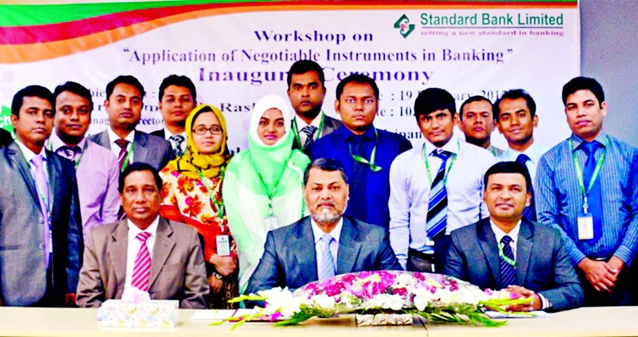 Mamun-Ur-Rashid, MD and CEO of Standard Bank Limited poses with the participants attended at a two day-long workshop on "Application of Negotiable Instruments in Banking" organized by Standard Bank Training Institute recently in the city. Among others M