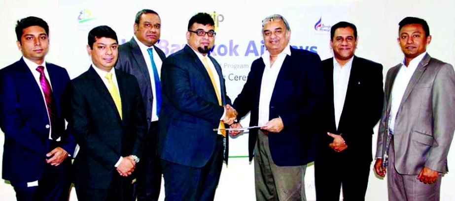M Nazeem A Choudhury, Head of Consumer Banking of Eastern Bank Ltd (EBL) and Rezaul Amin, Chief Commercial Officer, Air Galaxy Ltd, GSA of Bangkok Airways exchanging documents after signing a Zero percent Installment Plan (ZIP) agreement in the city recen