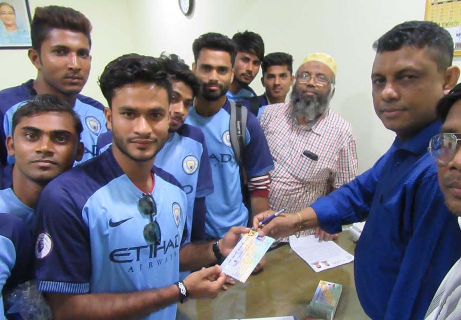 Players of Bangladesh Boys Club complete their players' transfer window for the upcoming Saif Power Tec First Division Football League at Dhaka Metropolis Football League Committee office room in Bangabandhu National Stadium on Sunday.