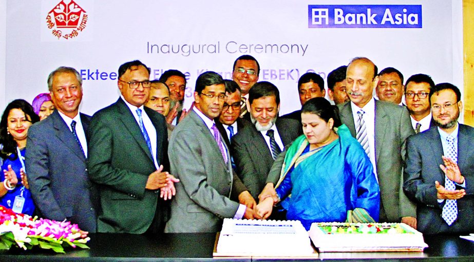 Md Arfan Ali, Managing Director of Bank Asia Ltd, inaugurating its 3rd Phase online banking service to the Government's poverty alleviation project "Ektee Baree Ektee Khamar (EBEK)" by cutting cake at the banks head office in the city on Monday. Humai