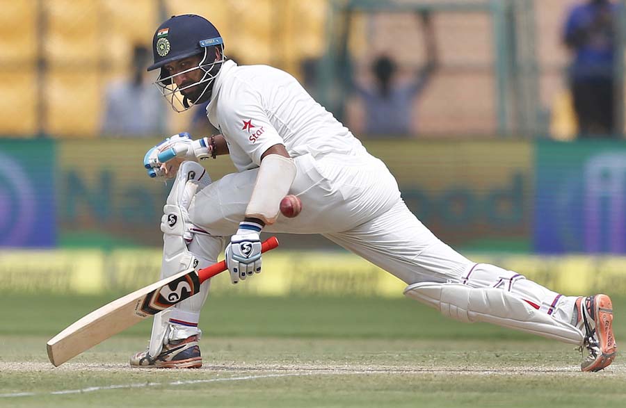 Cheteshwar Pujara plays the ball on the leg side, India v Australia, 2nd Test, Bengaluru, 3rd day on Monday.