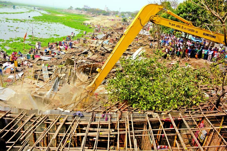 BIWTA conducted eviction drive against illegally built structures on the bank of Turag River at Diabari in Mirpur on Monday.