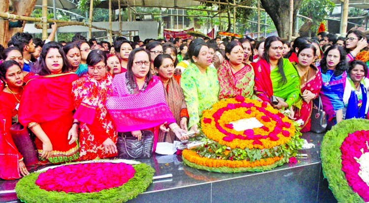 Leaders and activists of Awami Mahila Jubo League placing floral wreaths at the portrait of Bangabandhu at 32, Dhanmondi in the city on Tuesday marking historic March 7.