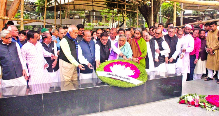 Bangladesh Awami League placing floral wreaths at the portrait of Father of the Nation Bangabandhu Sheikh Mujibur Rahman at 32, Dhanmondi in the city on Tuesday marking historic March 7.