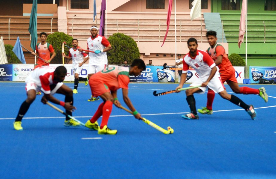 A moment of the match of the World Hockey (Men's) League round 2 between Oman and Bangladesh at the Moulana Bhashani National Hockey Stadium on Tuesday.