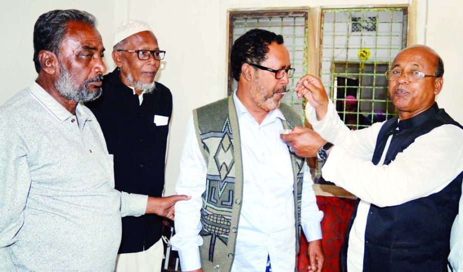 RANGABALI (Patuakhali): Newly-elected Chairman of Rangabali Upazila Parishad Principal Delwar Hossain is being greeted by defeated chairman candidate Jahangir Hossain Akhand recently.
