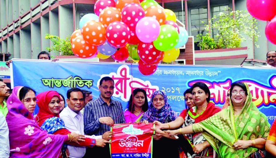 CCC Mayor A J M Nasir Uddin inaugurating a rally on the occasion of the International Women's Day on Wednesday.