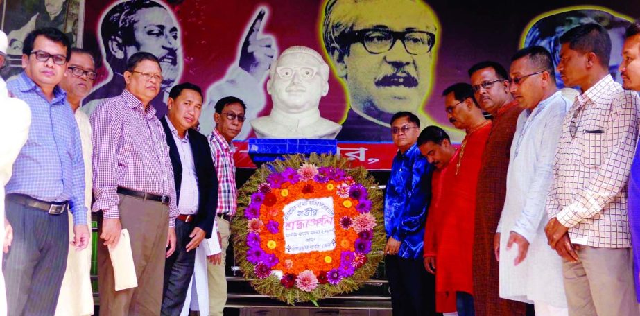 Leaders of Khagrachharai Awami League placing wreaths at the monument of Bangabandhu Sheikh Mujibur Rahman marking the historic 7th March on Tuesday.