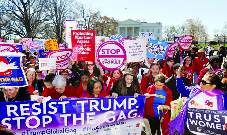 Activists march past the White House as part of 'A Day Without a Woman' strike on International Women's Day in Washington, U.S., on Wednesday. Internet photo