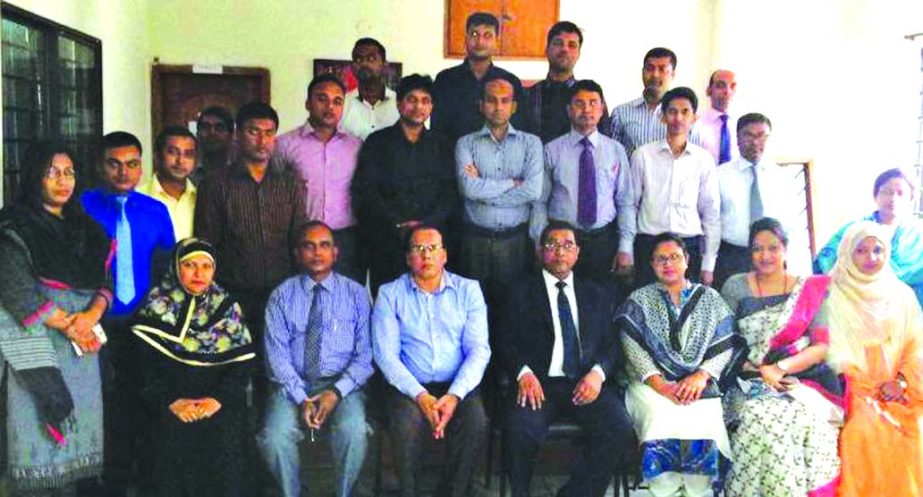 Md Nazim Uddin, Deputy Managing Director of Janata Bank Ltd, poses with the participants of "Managers Induction Course" at the bank staff college in the city recently. A total 25 officers of the bank attended in the course.