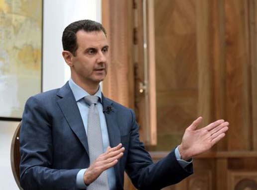 Syria's President Bashar al-Assad speaks during an interview with Yahoo News.