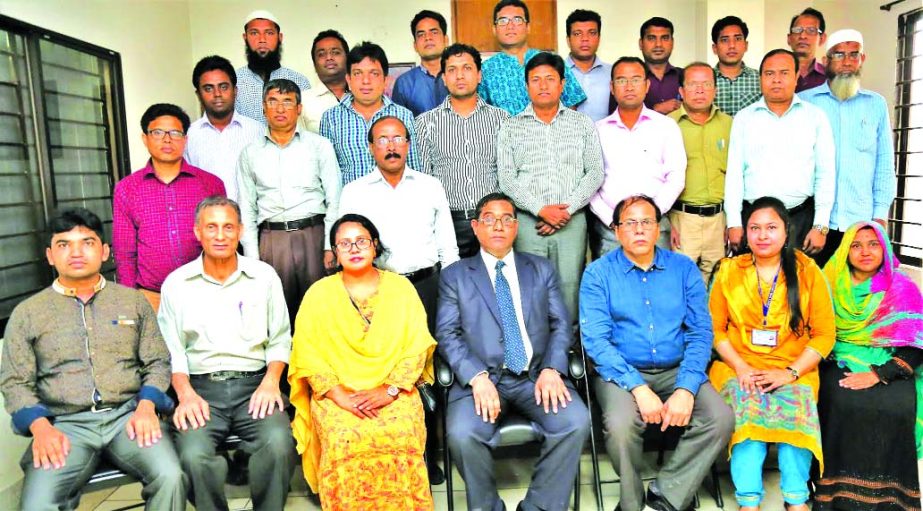 Md Nazim Uddin, Deputy Managing Director, Janata Bank Limited poses with the participants of workshop on 'Identifying the Original Bank Note' at Janata Bank Staff College (JBSC) in the city on Saturday. Md Sazedur Rahman, General Manager (HR) and Kazi G