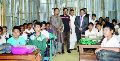 SYLHET: Monir Ahmed, Chairman of GMG Air Cargo visiting Jagoron High School at Biswanath Upazila recently.