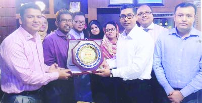 FENI: S M Jahangir Alam Sarkar, SP and Kazi Monir-uz-Zaman, Additional Police Super, Feni being greeted by leaders of Feni District Cultural Parishad at SP Office on Saturday.