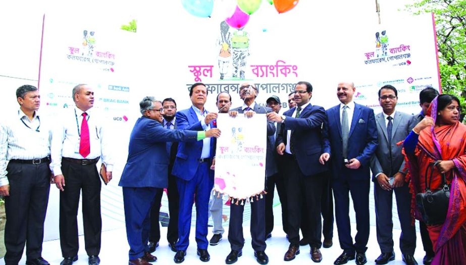 Bangladesh Bank Governor Fazle Kabir, inaugurating the United Commercial Bank (UCB) led School Banking Conference-2017 as chief guest at Gopalgonj on Saturday. Muhammad Mijanur Rahman Joaddar, Executive Director of Bangladesh Bank, Mohammad Mukhlesur Rah