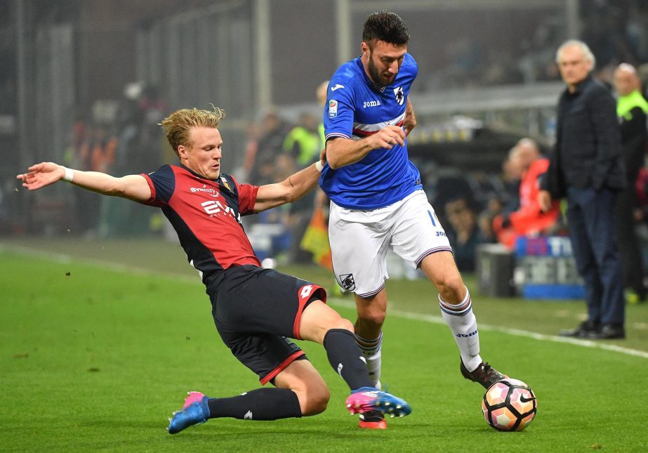 Genoa's Oscar Hiljemark, (left) and Sampdoria's Vasco Regini vie for the ball during a Serie A soccer match between Genoa and Sampdoria at Luigi Ferraris stadium in Genoa, Italy on Saturday.