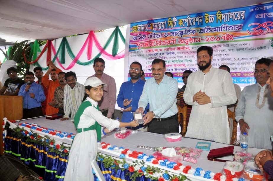CCC Mayor A J M Nasir Uddin giving prizes among the winners of annual sports and cultural competition of Bholanath Monorama City Corporation High School as Chief Guest on Sunday.