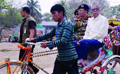 KISHOREGANJ: President Md Abdul Hamid visiting development works in haor areas at Mithamoin Bazar by rickshaw on Sunday.