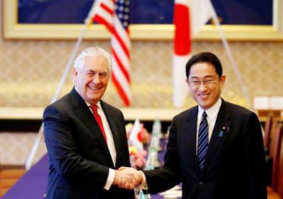 U.S. Secretary of State Rex Tillerson (L) shakes hands with Japan's Foreign Minister Fumio Kishida before their meeting at the foreign ministry's Iikura guest house in Tokyo, Japan on Thursday.
