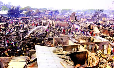 More than one hundred shanties were burnt to ashes in a devastating fire at Karai Slum in the city's Mohakhali on Thursday.